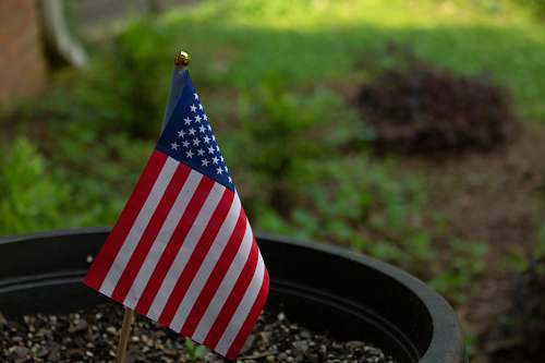 atlanta flag of U.S.A on plant pot park bench
